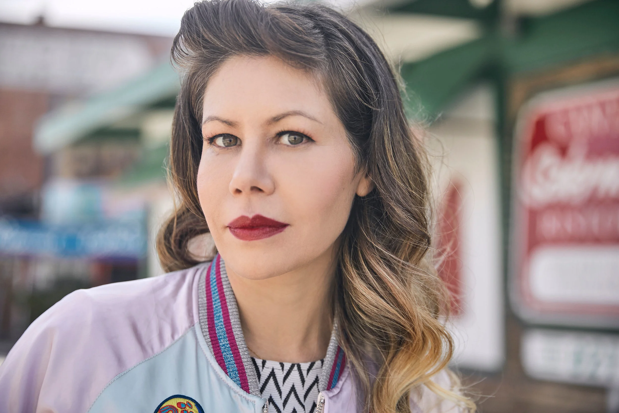 Karina Palmer portrait in satin jacket