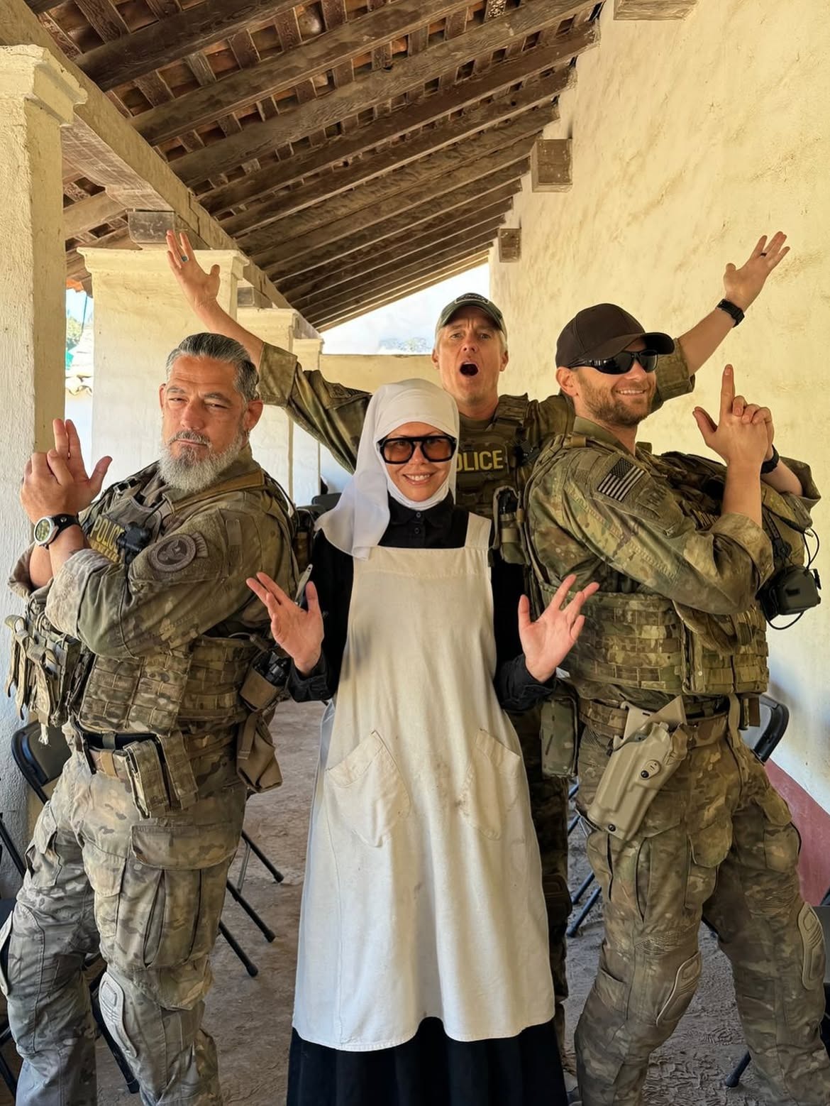 Karina Palmer with military-costumed performers on the set of One Battle After Another